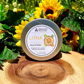 litha beard balm studio photography by brigid trading company llc kitsap county washington state lemons orange yellow background citrus with ylang ylang and natural myrtle essential oils aromatherapy premium grade all natural beard care balm for him man mens beard moustache care shaping sculpting hand made in washington state